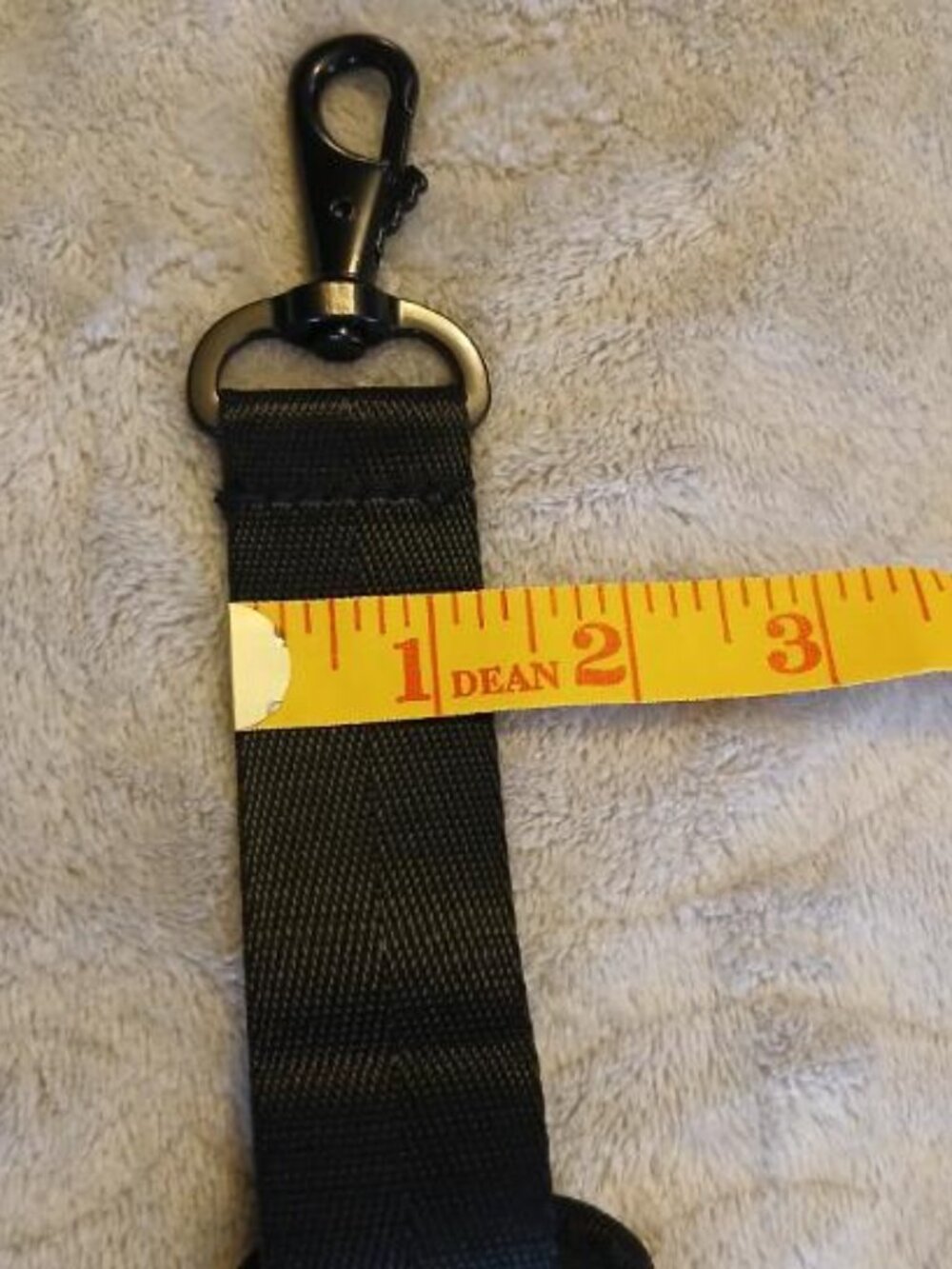 black adjustable bag strap with shoulder pad